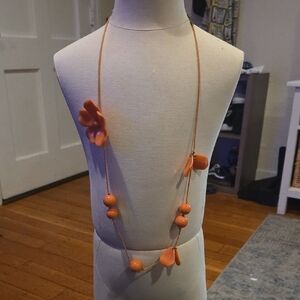 Orange Beaded Necklace with Floral Accents